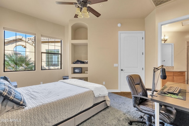 bedroom with tile patterned floors and ceiling fan