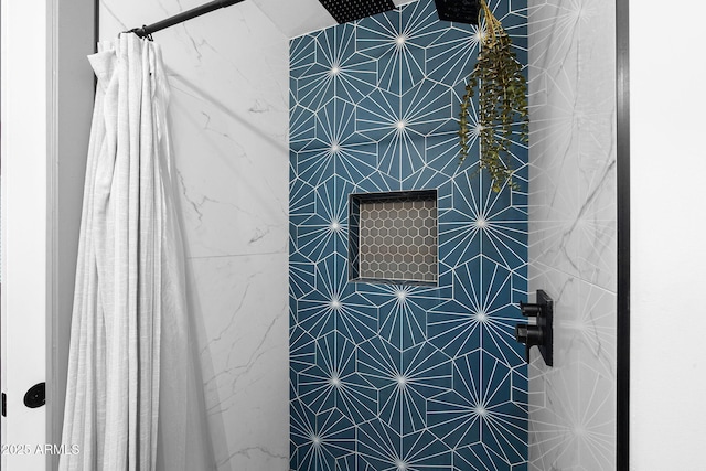 room details with a tile shower