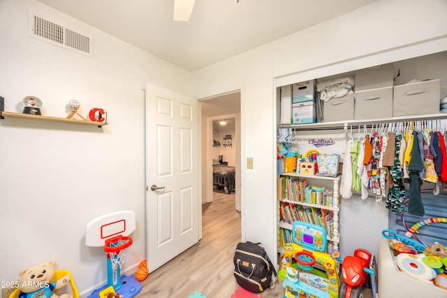 recreation room featuring light hardwood / wood-style flooring