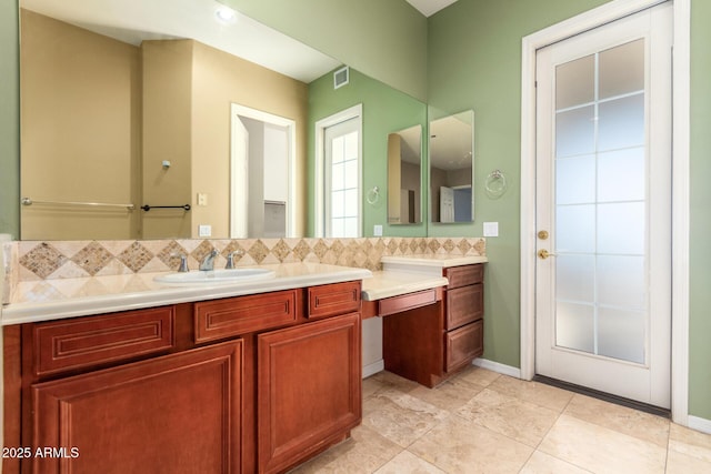 full bathroom featuring visible vents, vanity, and decorative backsplash