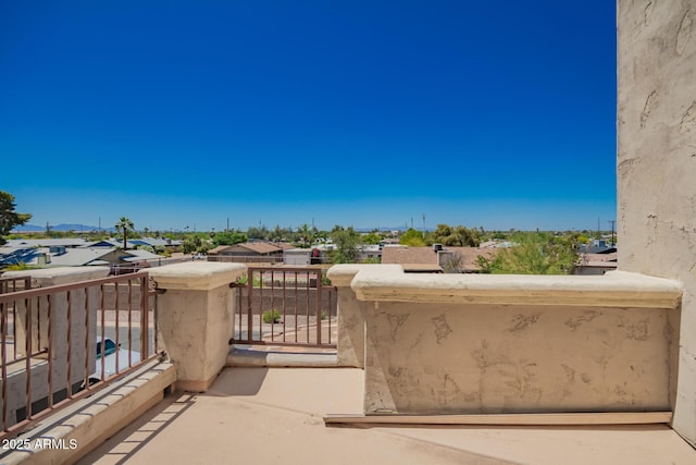 balcony featuring a residential view