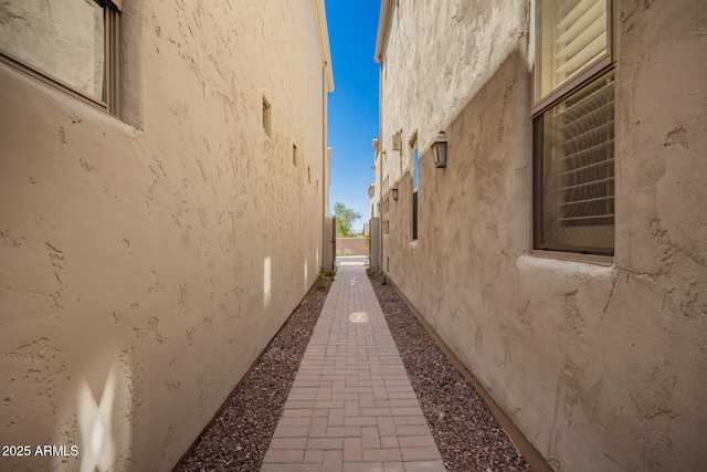 view of side of home featuring stucco siding