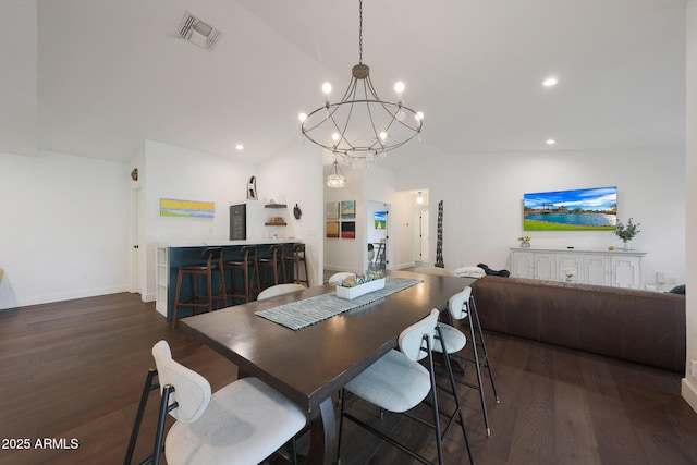 dining room featuring recessed lighting, wood finished floors, visible vents, vaulted ceiling, and an inviting chandelier