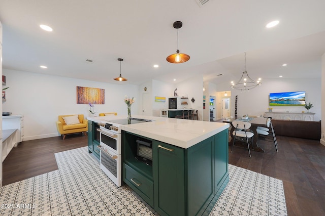 kitchen featuring green cabinets, dark wood-style flooring, electric range, and open floor plan