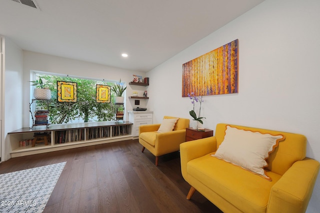 sitting room featuring hardwood / wood-style flooring, visible vents, and recessed lighting