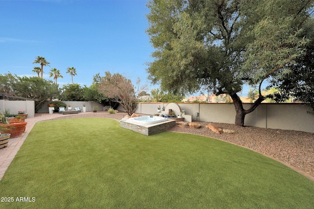 view of yard with a fenced backyard