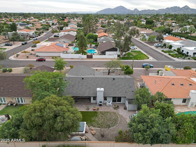 bird's eye view with a residential view and a mountain view