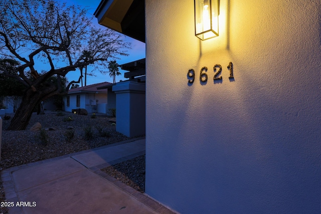 exterior space with stucco siding