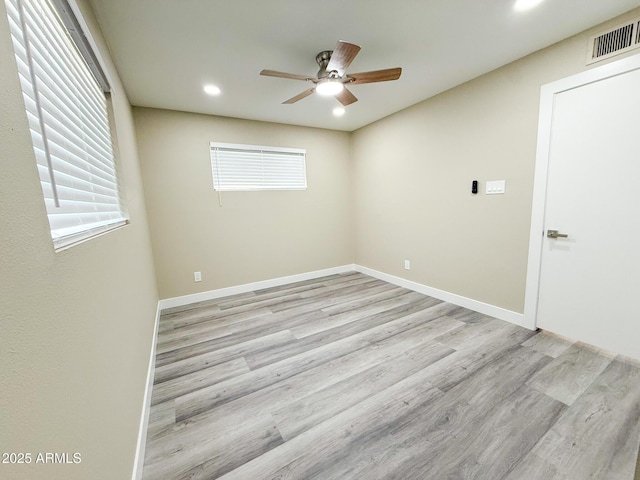 unfurnished room featuring visible vents, baseboards, ceiling fan, recessed lighting, and wood finished floors