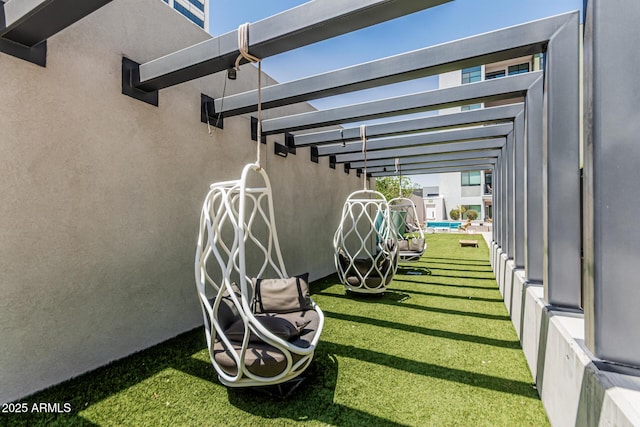 3131 N Central Ave Unit 7004, Phoenix, AZ 85012 - view of green lawn with a pergola