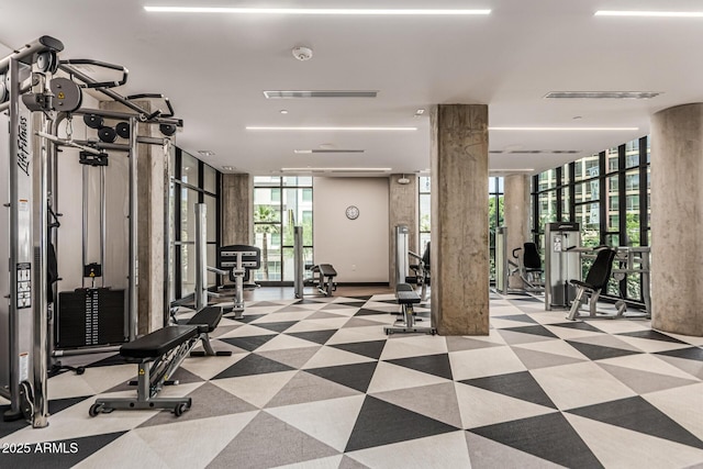 3131 N Central Ave Unit 7004, Phoenix, AZ 85012 - exercise room with a wall of windows and ornate columns