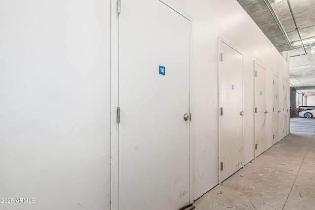 3131 N Central Ave Unit 7004, Phoenix, AZ 85012 - hallway featuring concrete floors