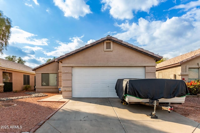 view of front of house with an outbuilding and a garage