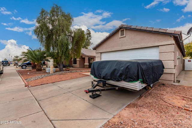 view of home's exterior with a garage