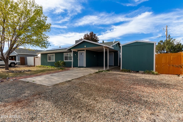 single story home with a carport