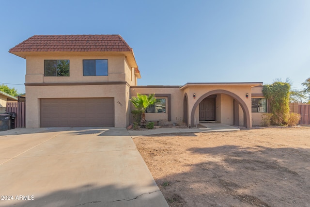 view of front of property with a garage