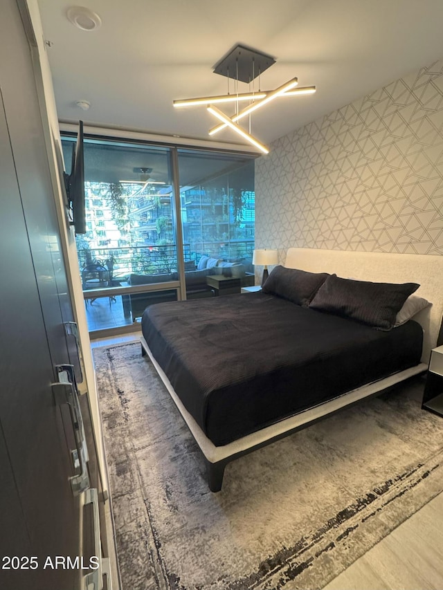 7120 E Kierland Blvd Unit 404, Scottsdale, AZ 85254 - bedroom featuring a chandelier