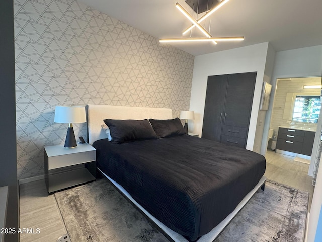 7120 E Kierland Blvd Unit 404, Scottsdale, AZ 85254 - bedroom with light wood-type flooring