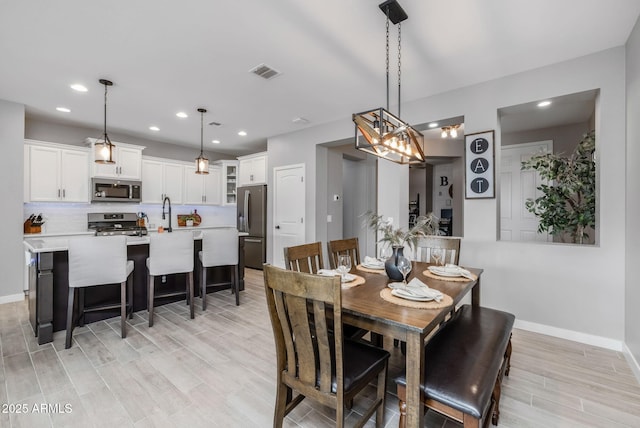 dining room featuring light wood-type flooring