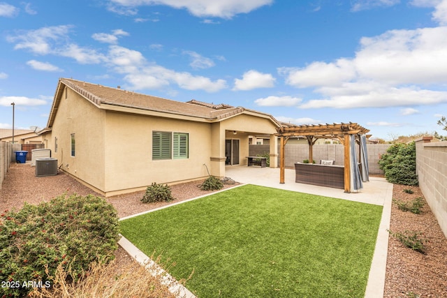 rear view of property featuring central air condition unit, a lawn, a pergola, an outdoor living space, and a patio