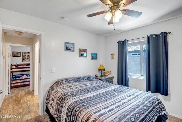 15558 N Ulrich Way, Surprise, AZ 85374 - bedroom featuring a ceiling fan and light wood finished floors