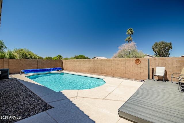 15558 N Ulrich Way, Surprise, AZ 85374 - view of pool featuring a fenced backyard, central AC, and a patio area
