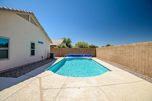 15558 N Ulrich Way, Surprise, AZ 85374 - view of swimming pool featuring a fenced backyard, a patio, and central air condition unit