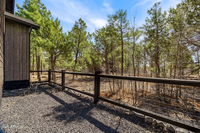view of gate with fence
