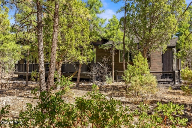 rear view of house with a deck