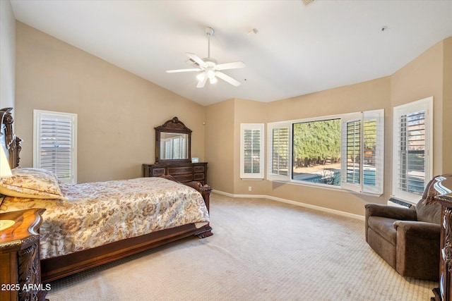 bedroom with lofted ceiling, light carpet, and ceiling fan