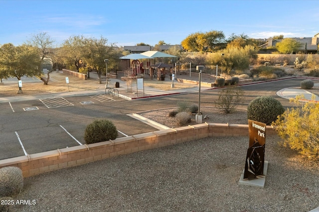 view of home's community featuring a playground