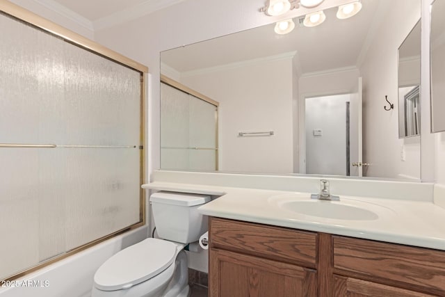 full bathroom featuring crown molding, enclosed tub / shower combo, vanity, and toilet