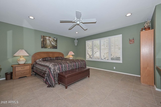 tiled bedroom featuring ceiling fan