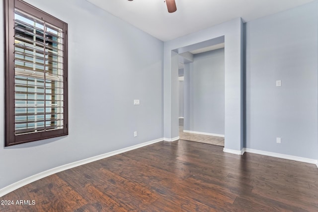 unfurnished room featuring ceiling fan and wood-type flooring