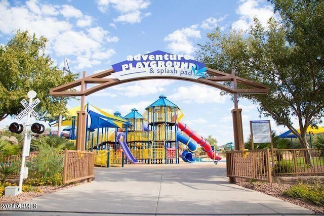 view of property's community with a playground