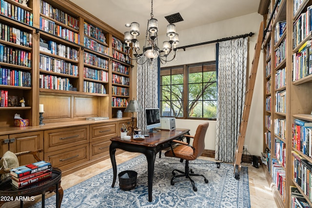 office space with an inviting chandelier