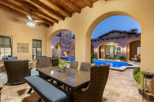 view of patio / terrace featuring ceiling fan