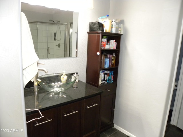 bathroom featuring vanity and tile floors