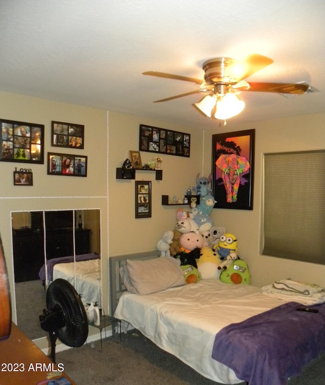 carpeted bedroom with ceiling fan