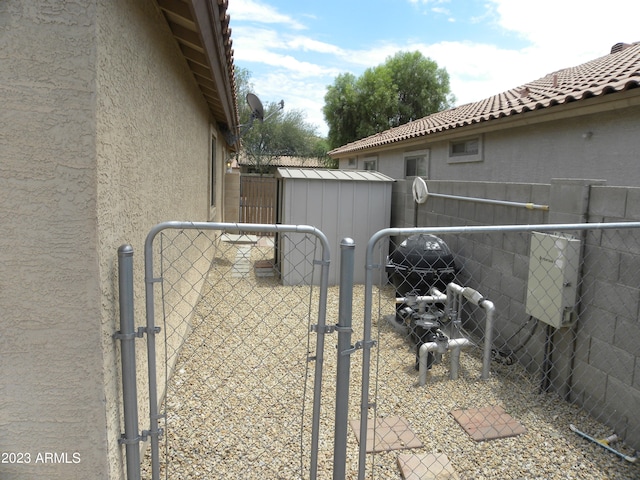 exterior space featuring a storage shed