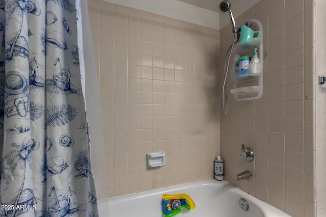 full bathroom featuring shower / bathtub combination with curtain