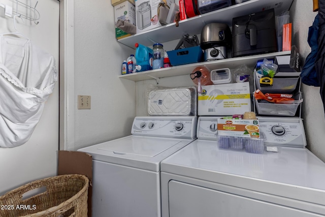 washroom with laundry area and separate washer and dryer