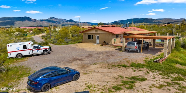 view of front of home featuring a mountain view