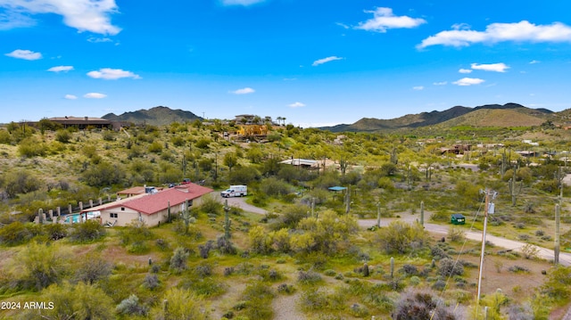 drone / aerial view featuring a mountain view