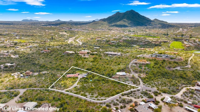 drone / aerial view featuring a mountain view