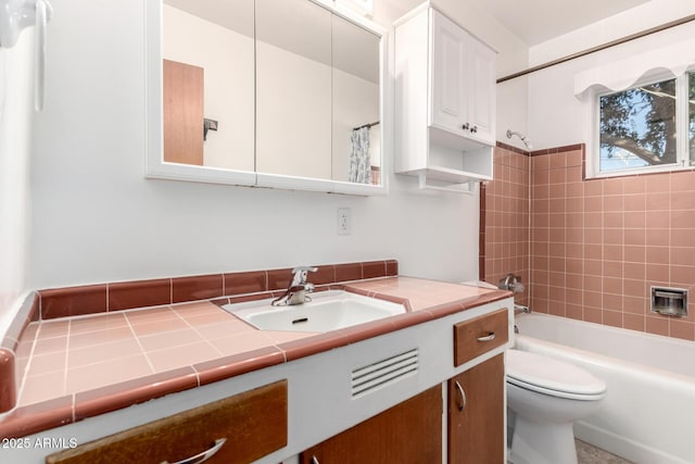 bathroom with vanity, toilet, and shower / tub combo with curtain