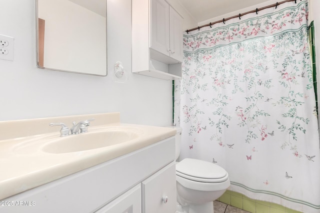 full bathroom with vanity, tile patterned floors, toilet, and a shower with curtain