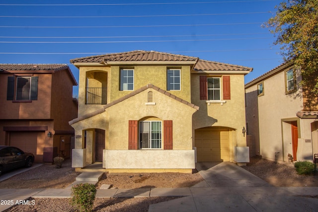 mediterranean / spanish-style home with a garage