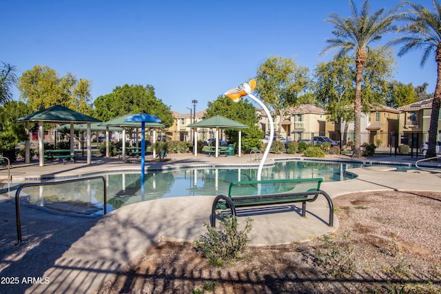 view of swimming pool featuring a gazebo and a patio area