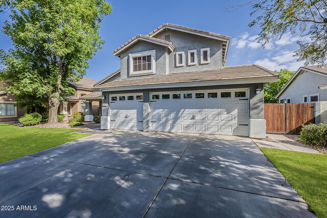 3252 E Lexington Ave, Gilbert, AZ 85234 - traditional home with a garage, driveway, stucco siding, and a tiled roof